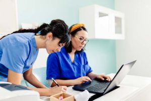 nurses looking at jobs with high travel nurse salary