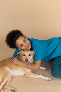 travel nursing professional with her dog